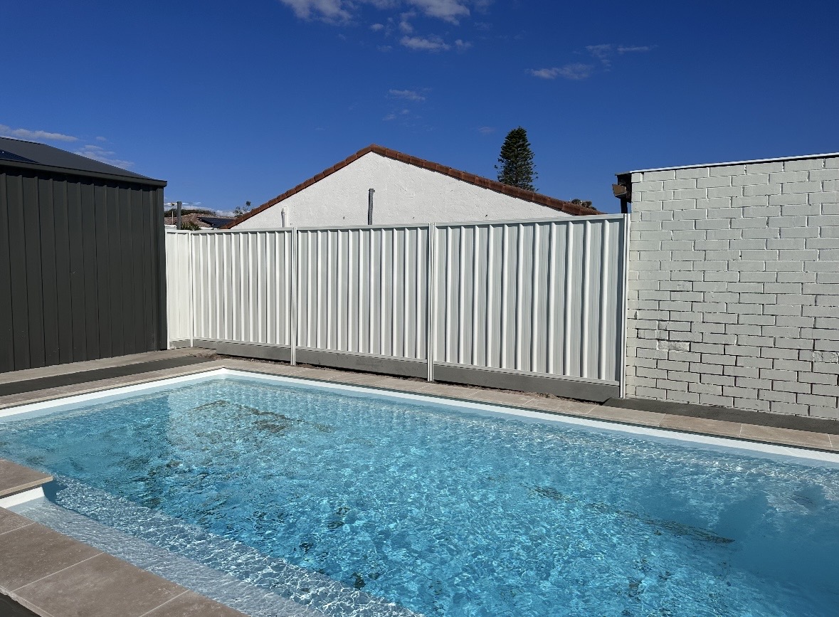 Designer fencing beside a backyard pool in Adelaide